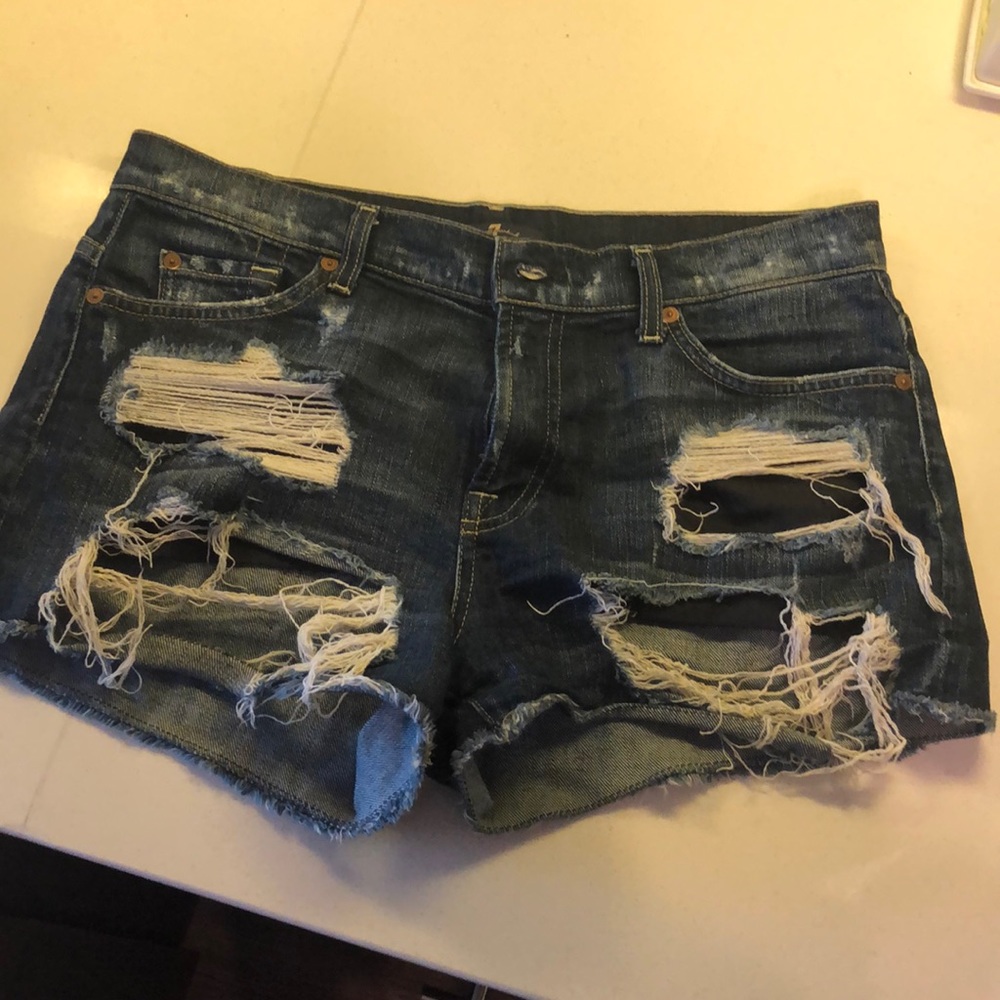 7 for all Mankind dark wash ripped jean shorts